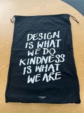 Kurt Geiger Black Drawstring Bag with White Slogan